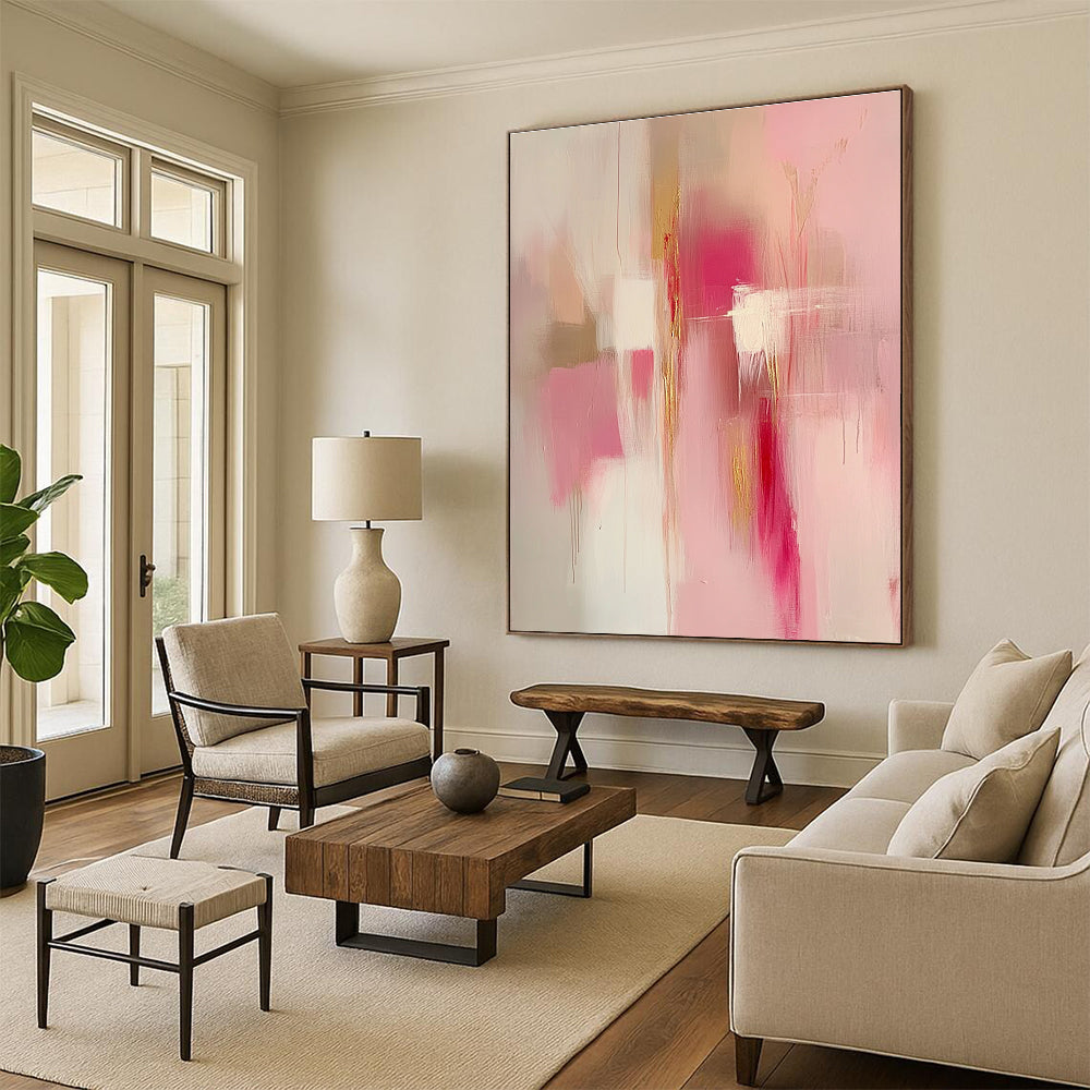 Large abstract painting in pink and gold tones featuring soft edges blurred details and emotional depth creating a serene romantic atmosphere.STSC784