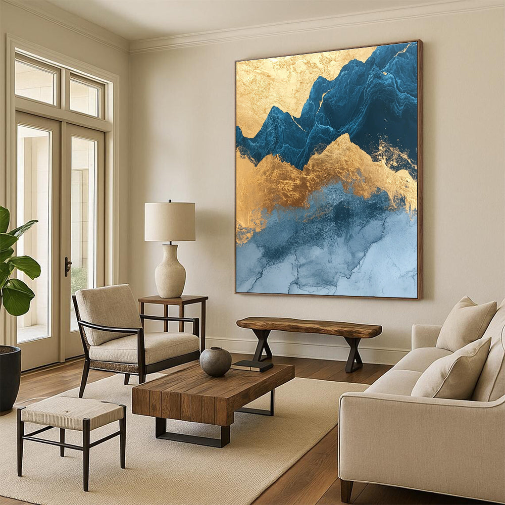 Abstract painting with marble texture rounded edges in gold foil and dark blue glass outlines featuring mountains and simple decorative lines.STSC1312