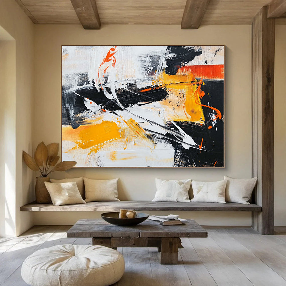 Large abstract painting in black white and orange featuring vibrant yellow brush strokes for a dynamic artistic touch.SC142
