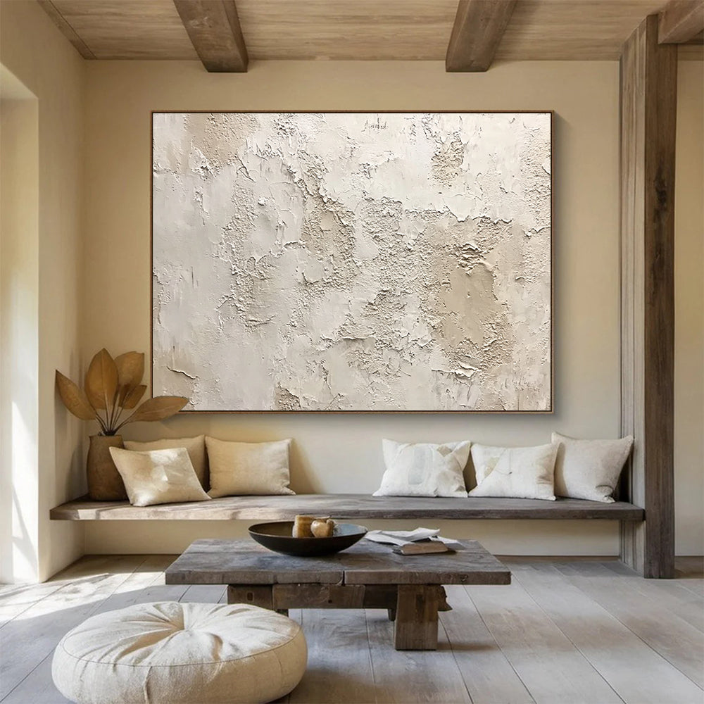 Large abstract painting of a textured white wall with shades of gray beige and brown showing organic shapes and a weathered appearance.SC183