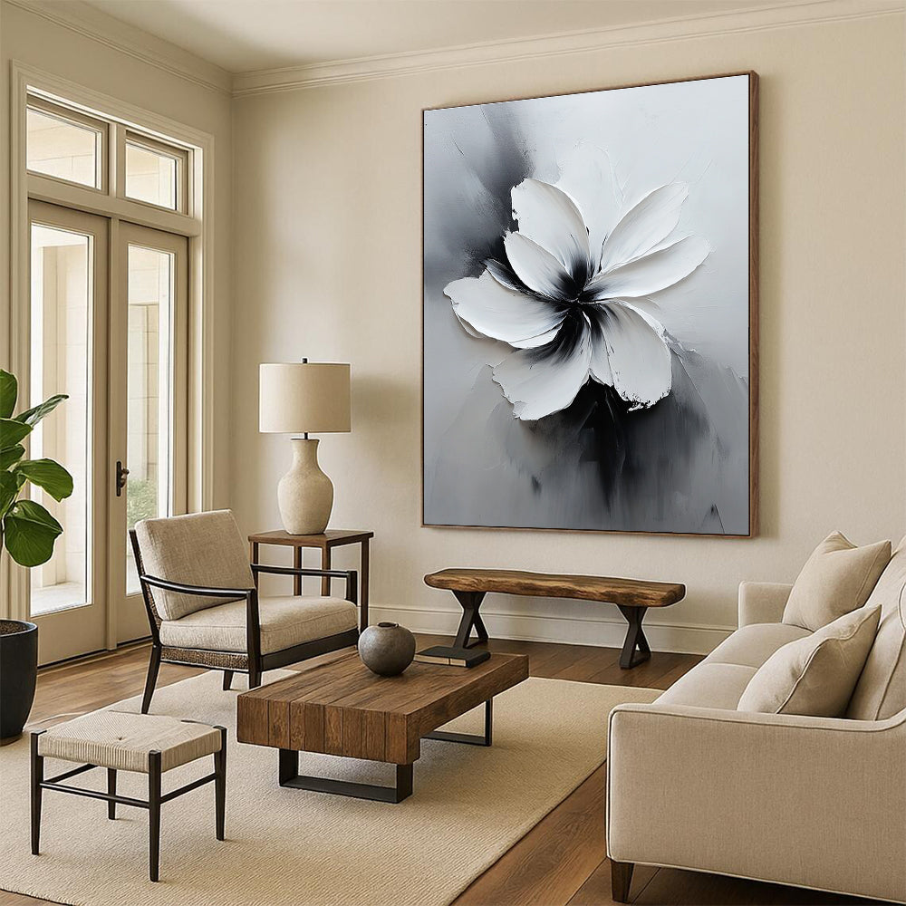 Large abstract white flower painting in black and gray with soft lighting and delicate textures creates an elegant minimalist art piece.STSC516