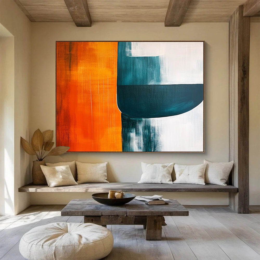 Large abstract painting featuring orange teal and grey shapes on a white background with negative space enhancing visual depth and minimalist style.SC249