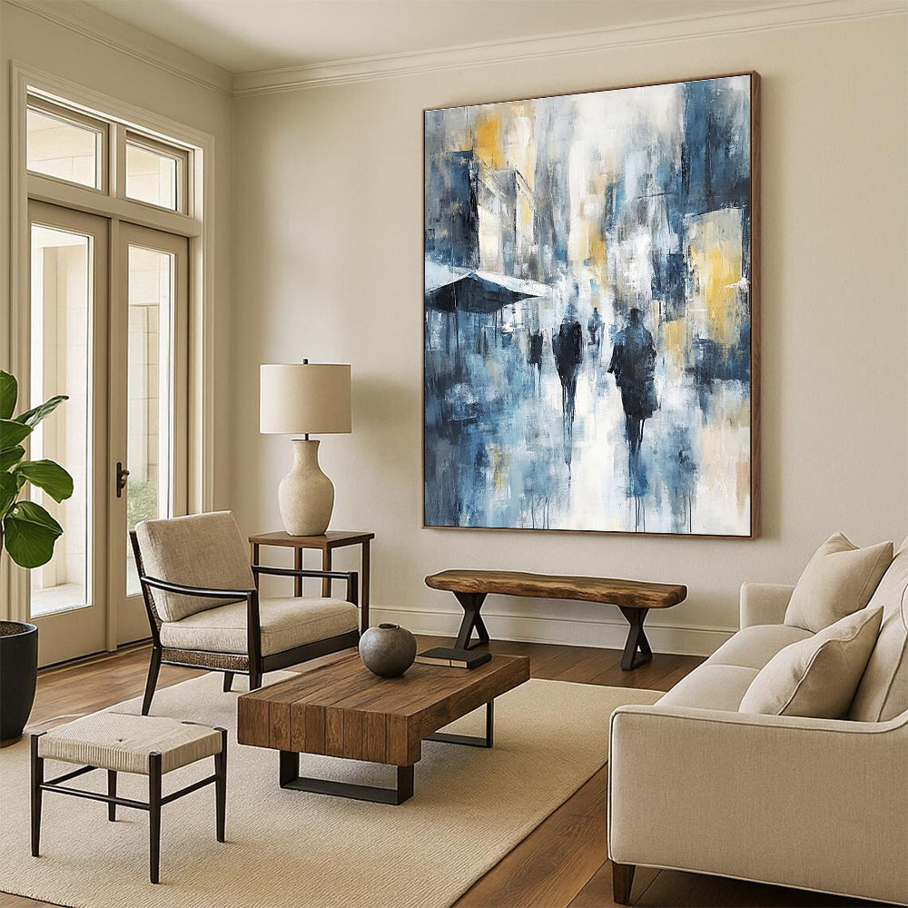 Large abstract painting of an urban cityscape in cool blue tones with hints of yellow and gray showcasing soft brushstrokes and impressionist influence.STSC277