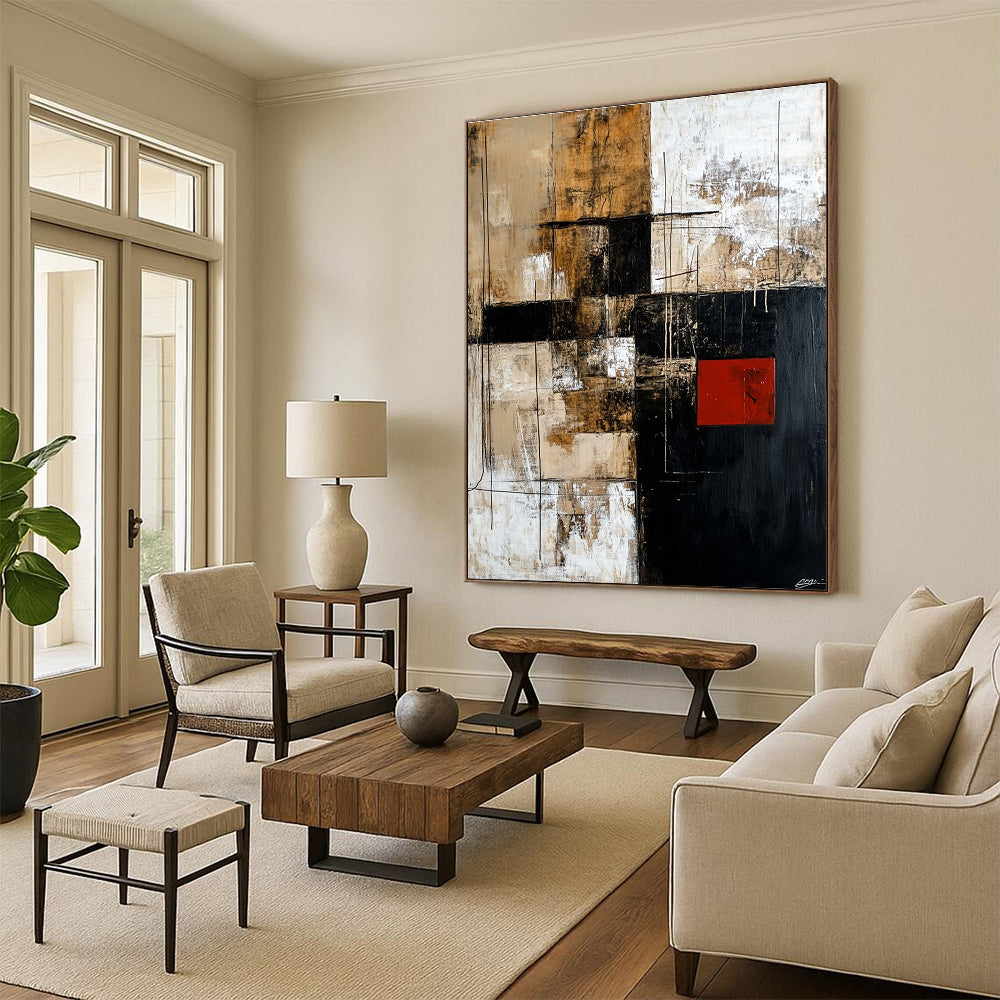 Large abstract painting in black brown beige and white with striking red square adds contrast to the dynamic design.STSC391
