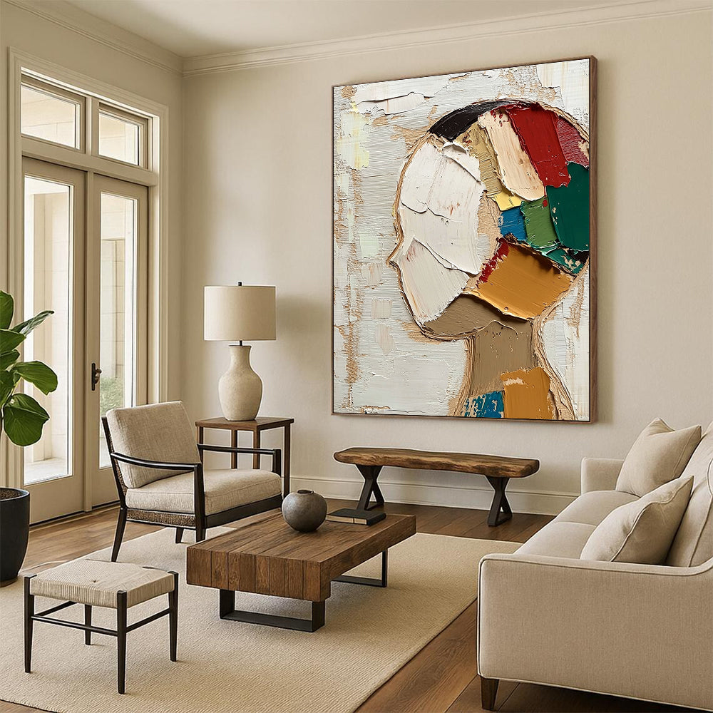 Large abstract painting featuring a round face with short hair in vibrant colors against a beige and white background with visible brush strokes.STSC197