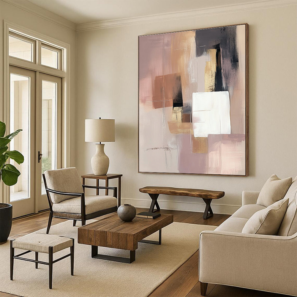 Large abstract painting in soft pink beige and grey with white squares and a brown gray shape featuring gold accents.STSC808