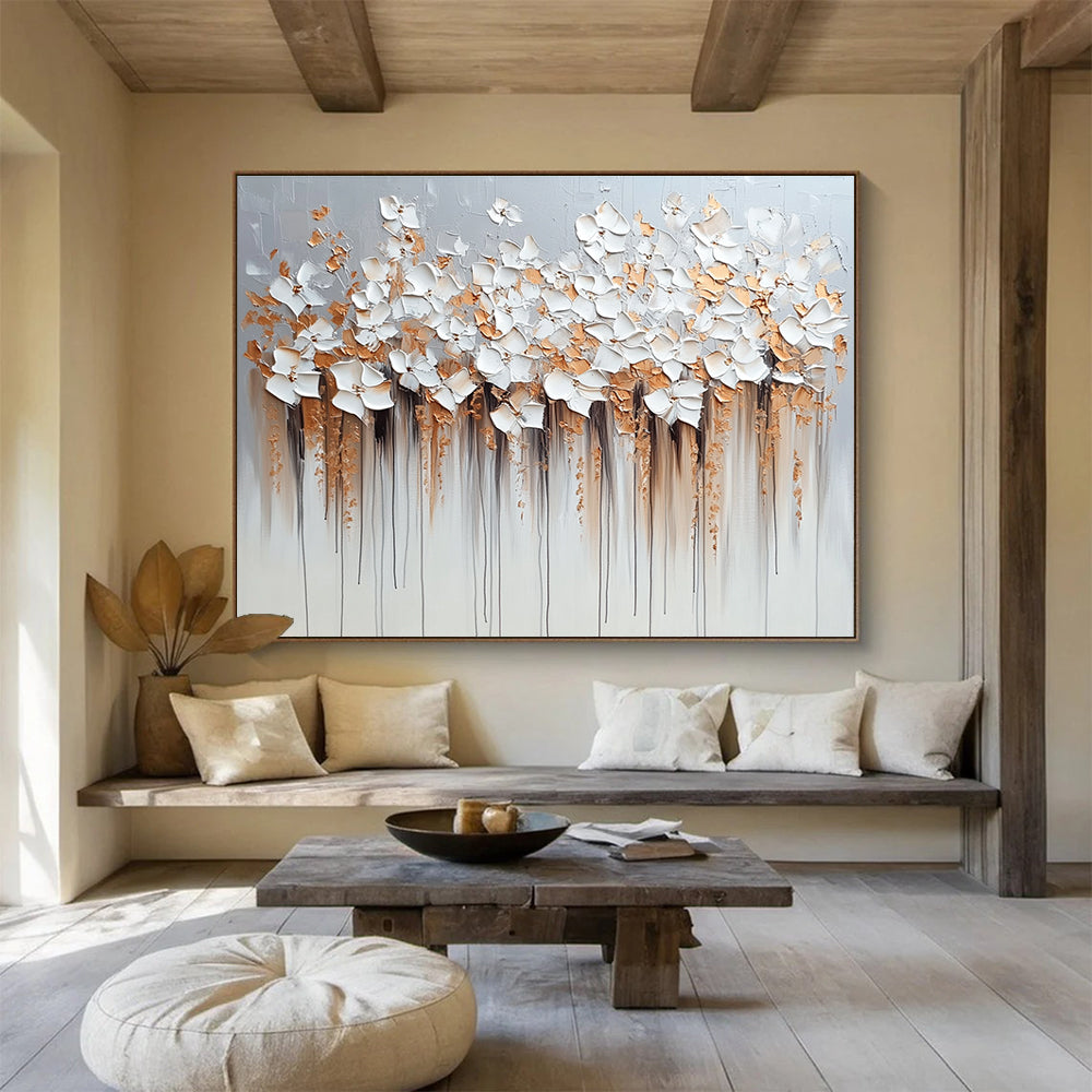 Large abstract painting with flowers in light gray and beige featuring dripped paint technique heavy impasto texture in silver and gold hues.SC294