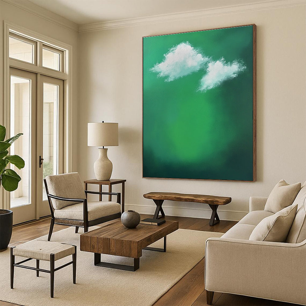 Large abstract painting featuring a green background with white clouds and sunlight effects evokes tranquility and calmness through minimalist brushstrokes.STSC1008