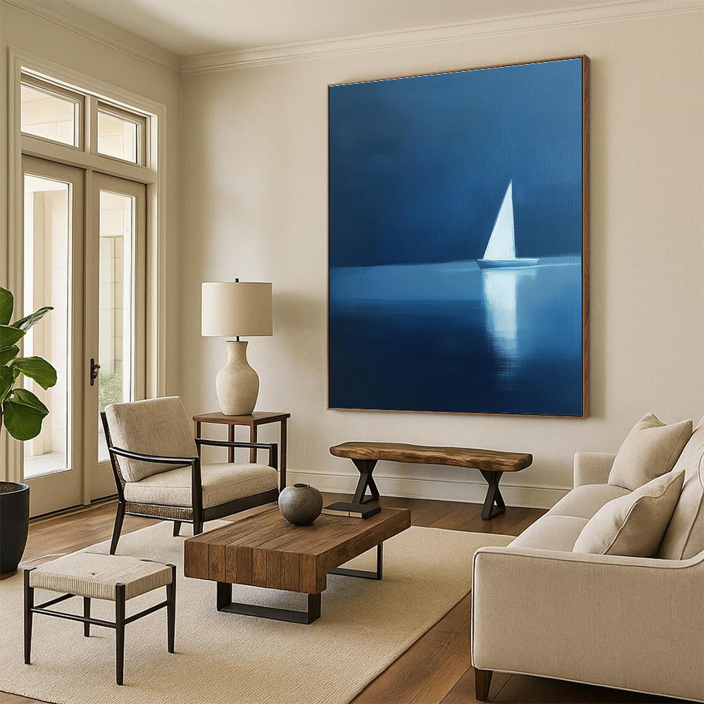 Abstract painting featuring a minimalist silhouette of a sailboat on calm water with elegant blue and white hues, creating a serene atmosphere.STSC1087