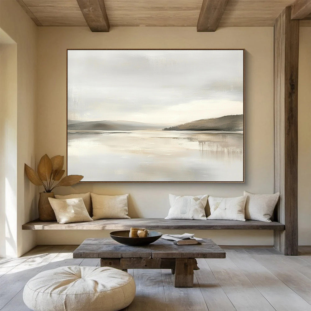 Large abstract painting featuring muted beige and gray tones with a soft sky and calm water for a tranquil and elegant atmosphere.SC065