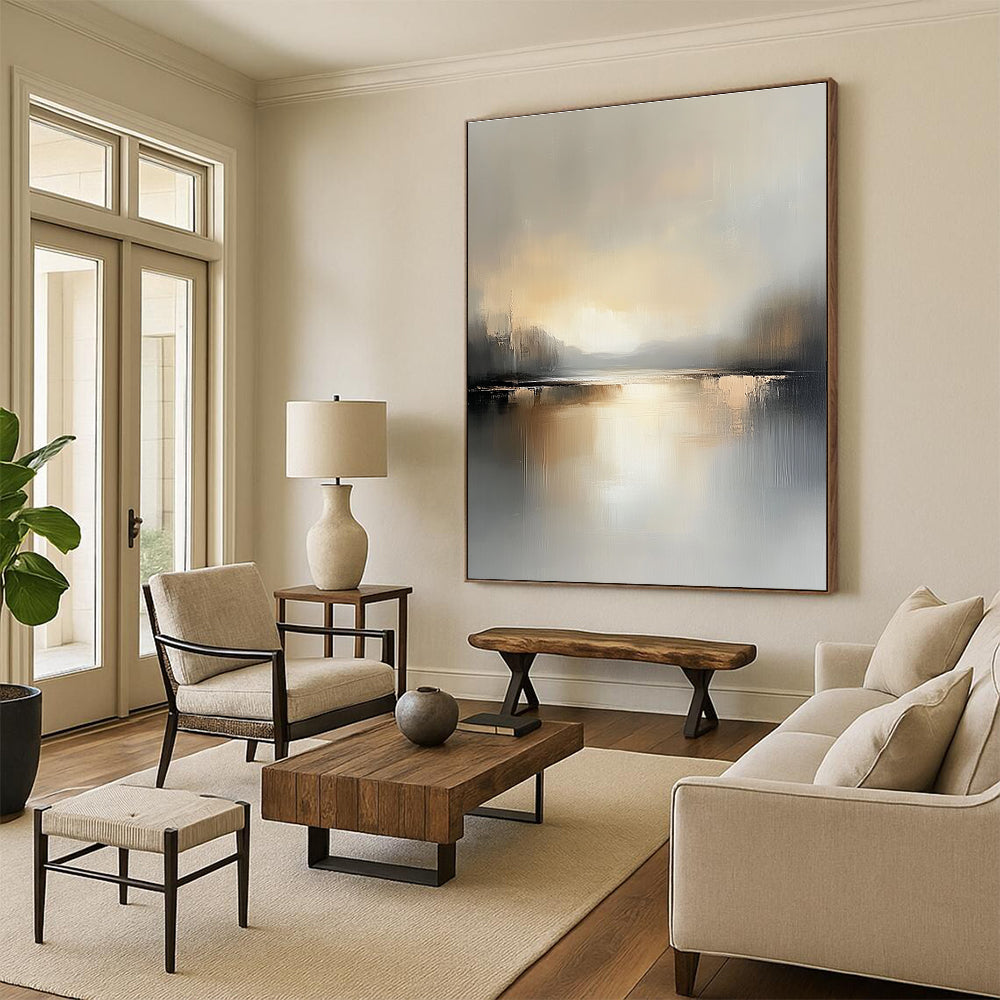 Large abstract landscape painting featuring a serene lake and soft gray beige tones capturing the tranquility of golden hour reflections.STSC084