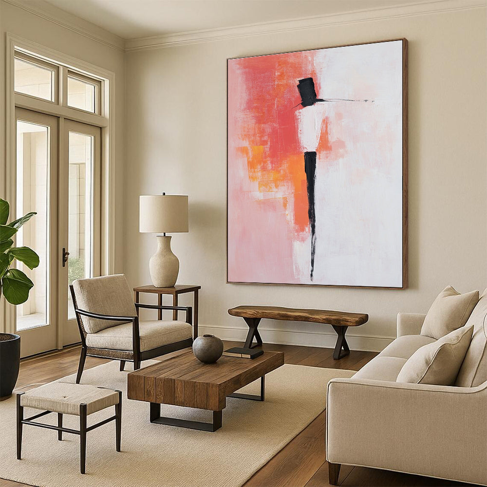 Large abstract painting with pink and white background featuring bold brush strokes simple shapes and peachy red accents with black dress shoes.STSC404