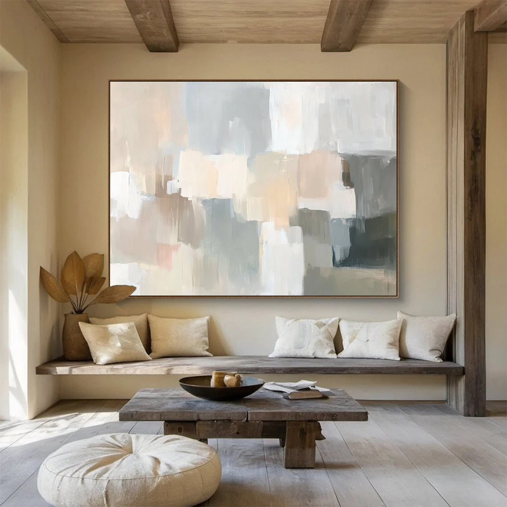 Large abstract painting in soft neutral tones featuring muted strokes of beige cream grey dusty pink pale sage green gray peach and light blue creating a serene scene.SC059