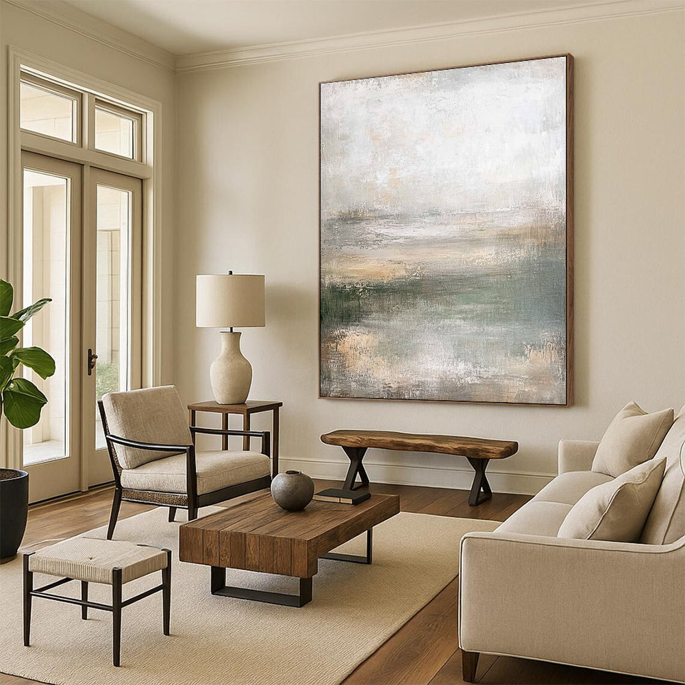 Large abstract painting in muted greens soft grays and beiges featuring a textured canvas and soft edges in neutral tones.STSC219