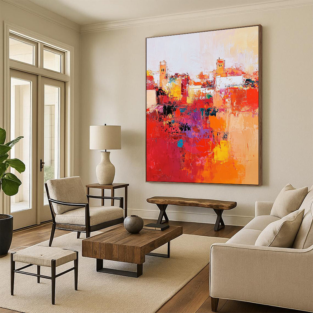 Large abstract painting depicting Marrakech cityscape with vibrant reds and oranges thick brush strokes and dynamic composition creating atmospheric lighting.STSC556