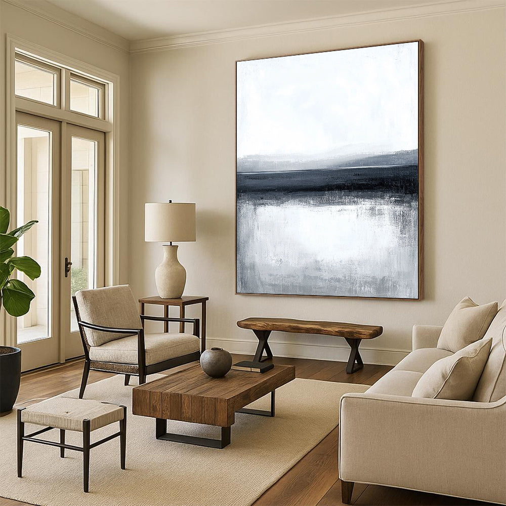 Large abstract painting featuring a serene water landscape with a gray sky and subtle brush strokes creating a calm minimalist design.STSC124