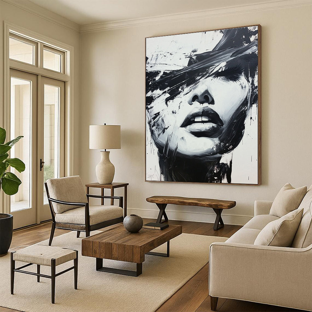 Large abstract black and white painting of a woman's face featuring expressive oil paint splatters in a dynamic graffiti style.STSC023