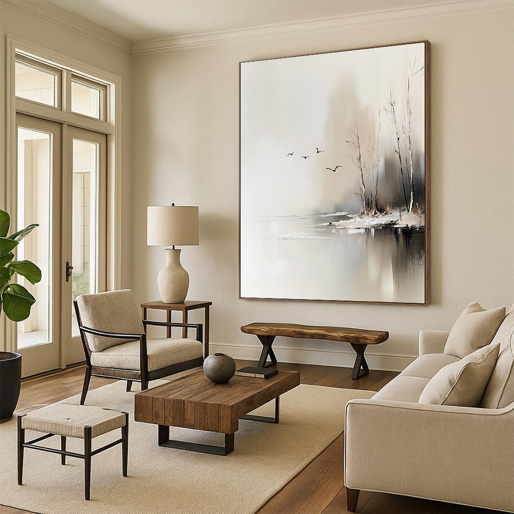 Large abstract painting depicting trees by an icy lake with flying birds, featuring neutral colors and delicate textures in a serene minimalist style.STSC105