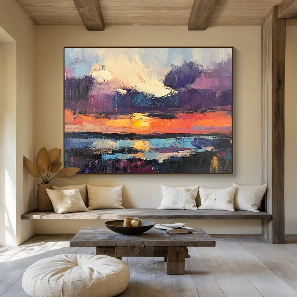 Large abstract painting featuring a sunset over water with bold brush strokes in vibrant purple and blue hues capturing a dramatic sky filled with clouds.SC134