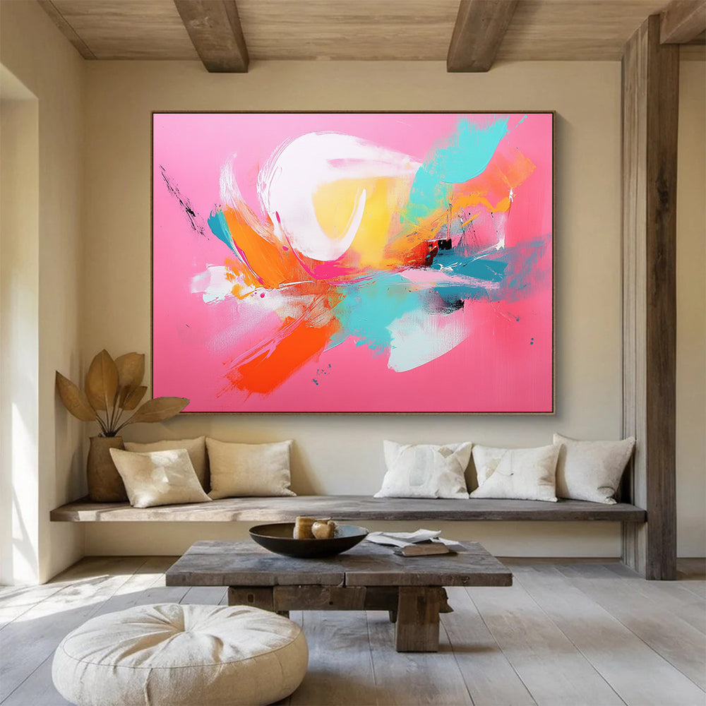 Large abstract painting with a pink background and vibrant orange and teal accents showcasing dynamic brush strokes.SC224