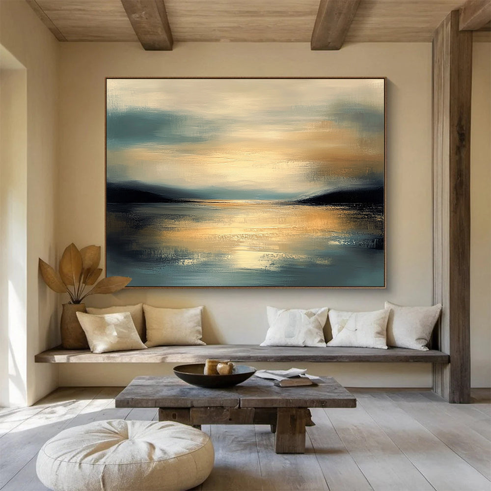 Large abstract painting featuring muted colors and calm water reflecting a detailed sky during golden hour with a serene atmosphere and gentle brushwork.SC064