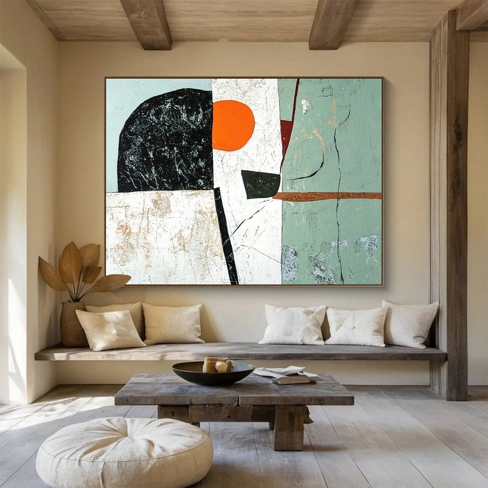 Large abstract painting featuring green black and white shapes with an orange accent and a brown line on a light gray and pale blue background.SC192