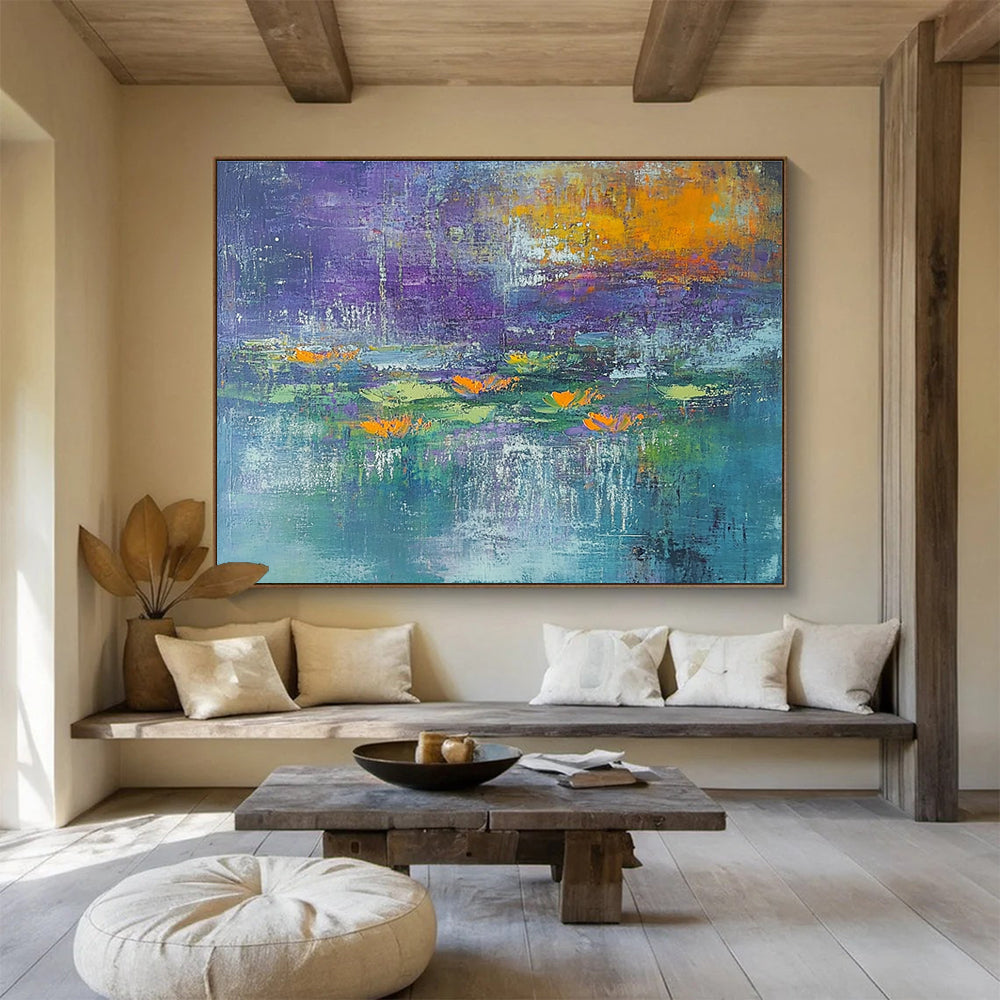 A large abstract painting featuring textured strokes in teal and purple with hints of orange and yellow, depicting serene water lilies at dawn.SC433