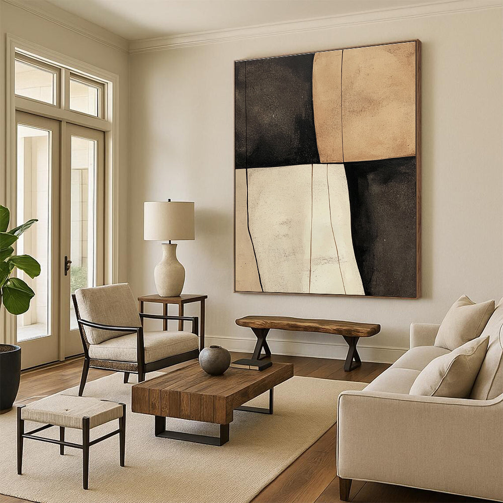 Large abstract painting featuring beige black and white shapes with smooth tan textures on a dark gray background.STSC627