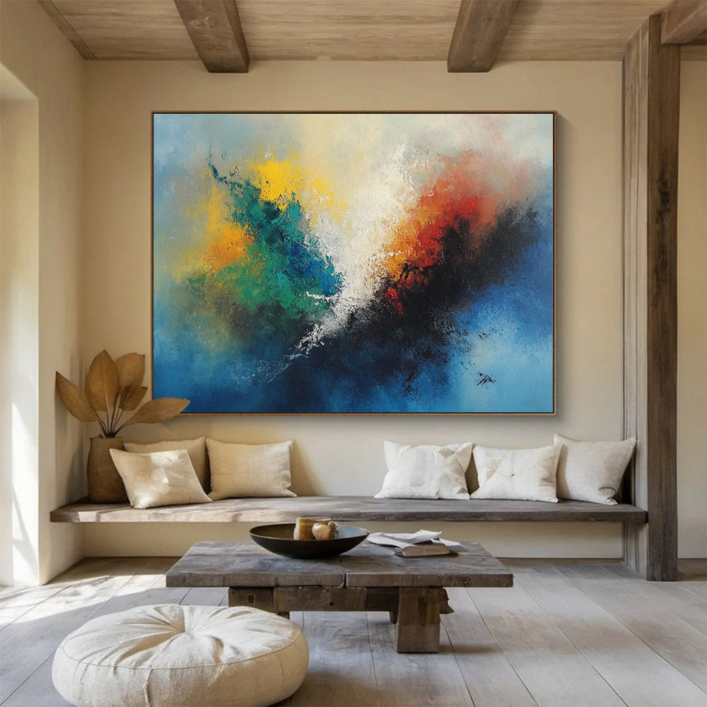 A large abstract painting featuring vibrant colors with a central fire-like figure and serene sky blue background.SC323