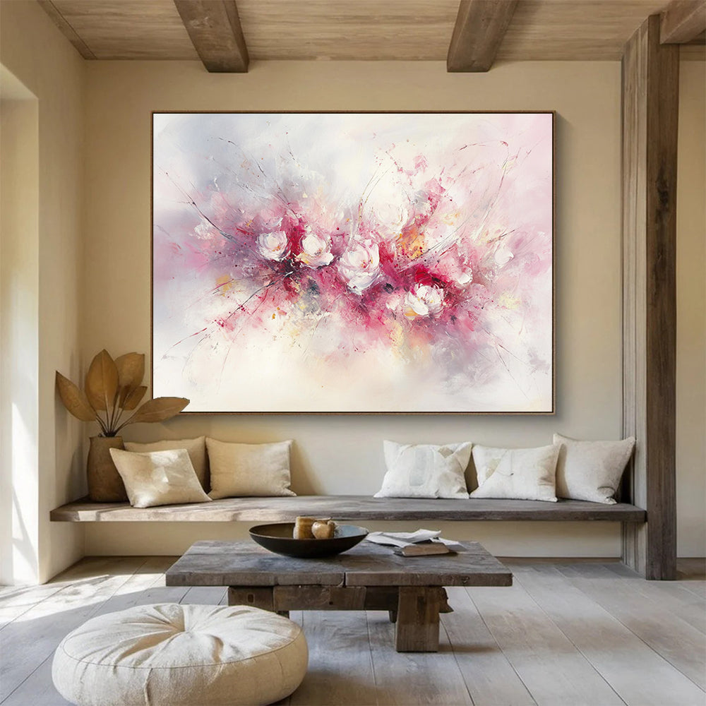 Large abstract painting of flowers in soft pink and white hues featuring bold brush strokes and delicate textures against a light background.SC191