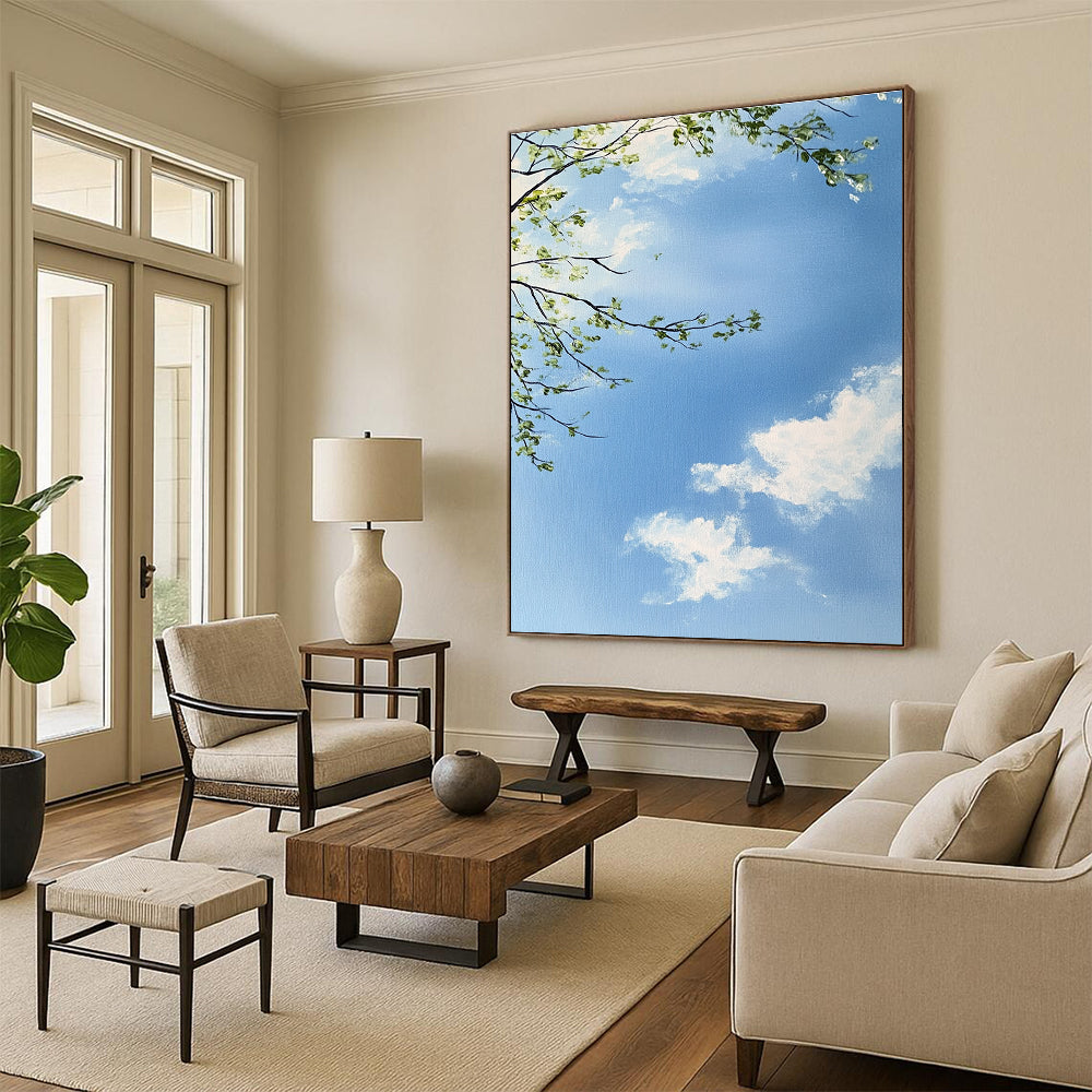A large abstract painting capturing a serene sky with branches and leaves featuring delicate brushstrokes and soft colors for a tranquil atmosphere.STSC1195