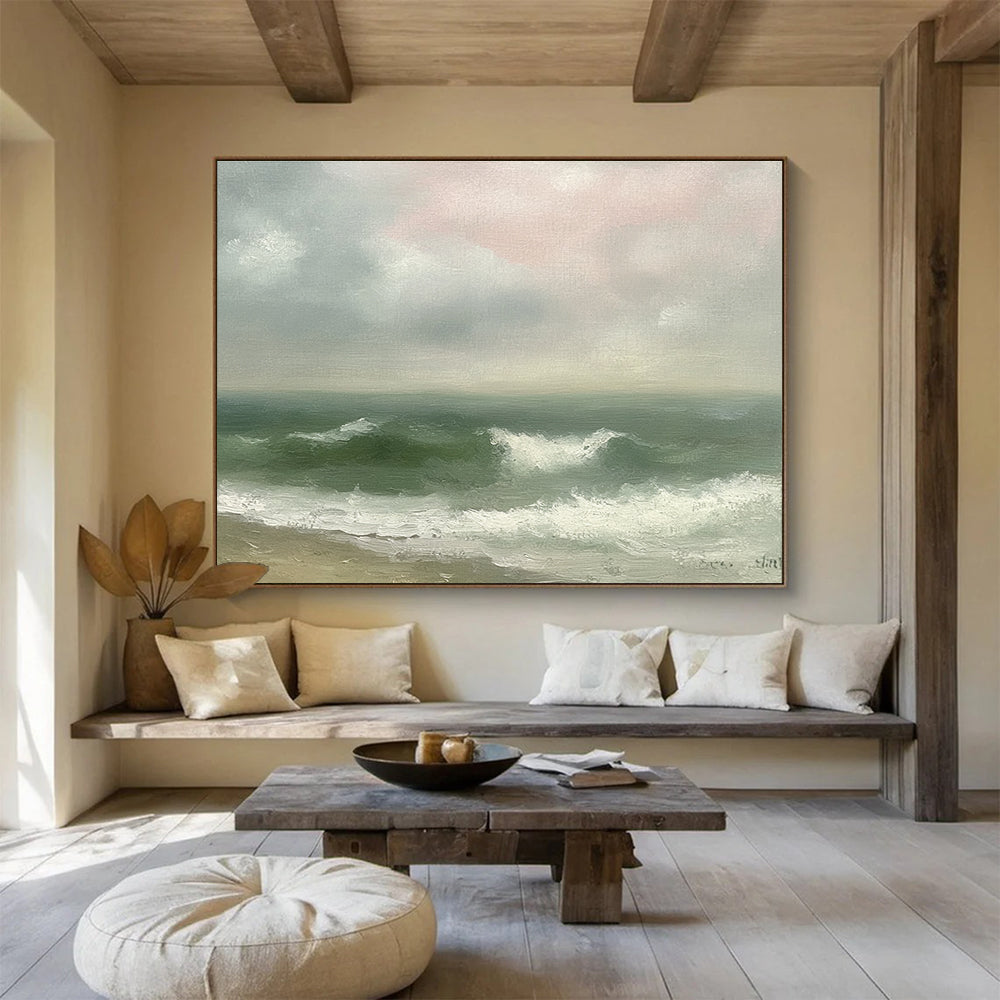 Large abstract painting depicting a vintage seascape with green and gray waves, an empty beach, and a soft pink sky in muted pastels.SC565