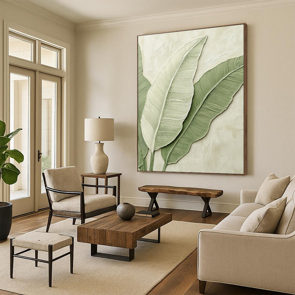 A large abstract painting of banana leaves in light green tones on a beige background, perfect for enhancing any modern space.STSC002