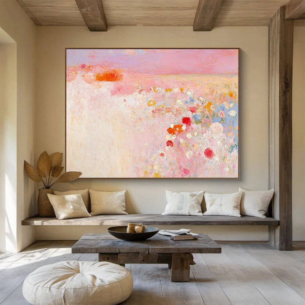 Large abstract painting in soft pink and white with hints of red and yellow evokes springtime calmness amidst a blooming field.SC350