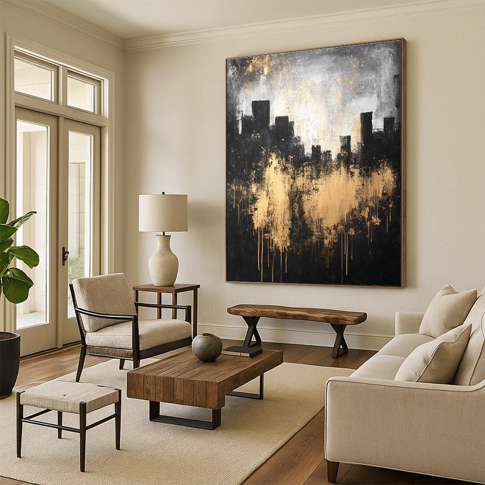Large abstract painting featuring a city silhouette in dark gray and light gold with textured canvas and atmospheric lighting.STSC216