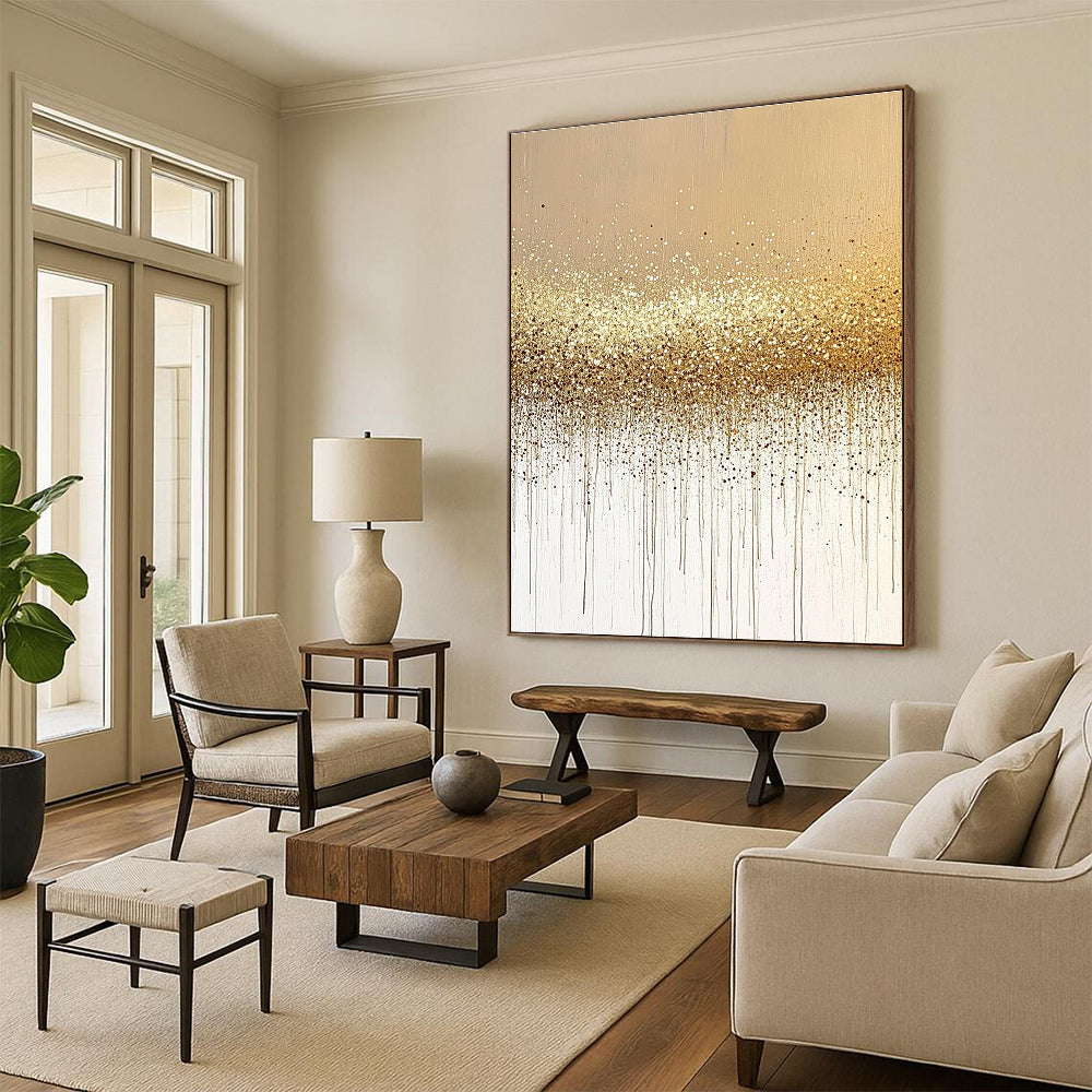 Abstract painting featuring sand and gold glitter on a neutral beige background, showcasing a minimalistic design in soothing tones.STSC994