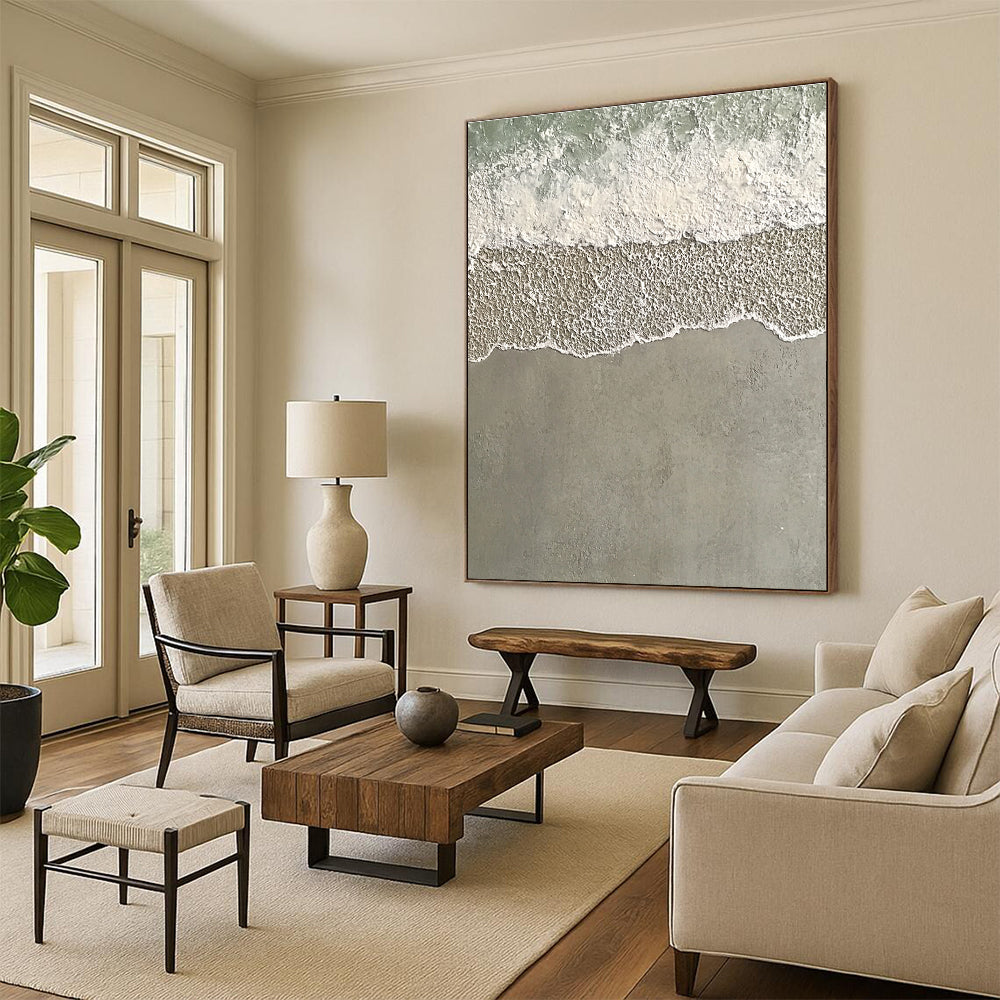Large abstract painting depicting serene water and sand with textured wave patterns in light green and grayish-white tones.STSC1136