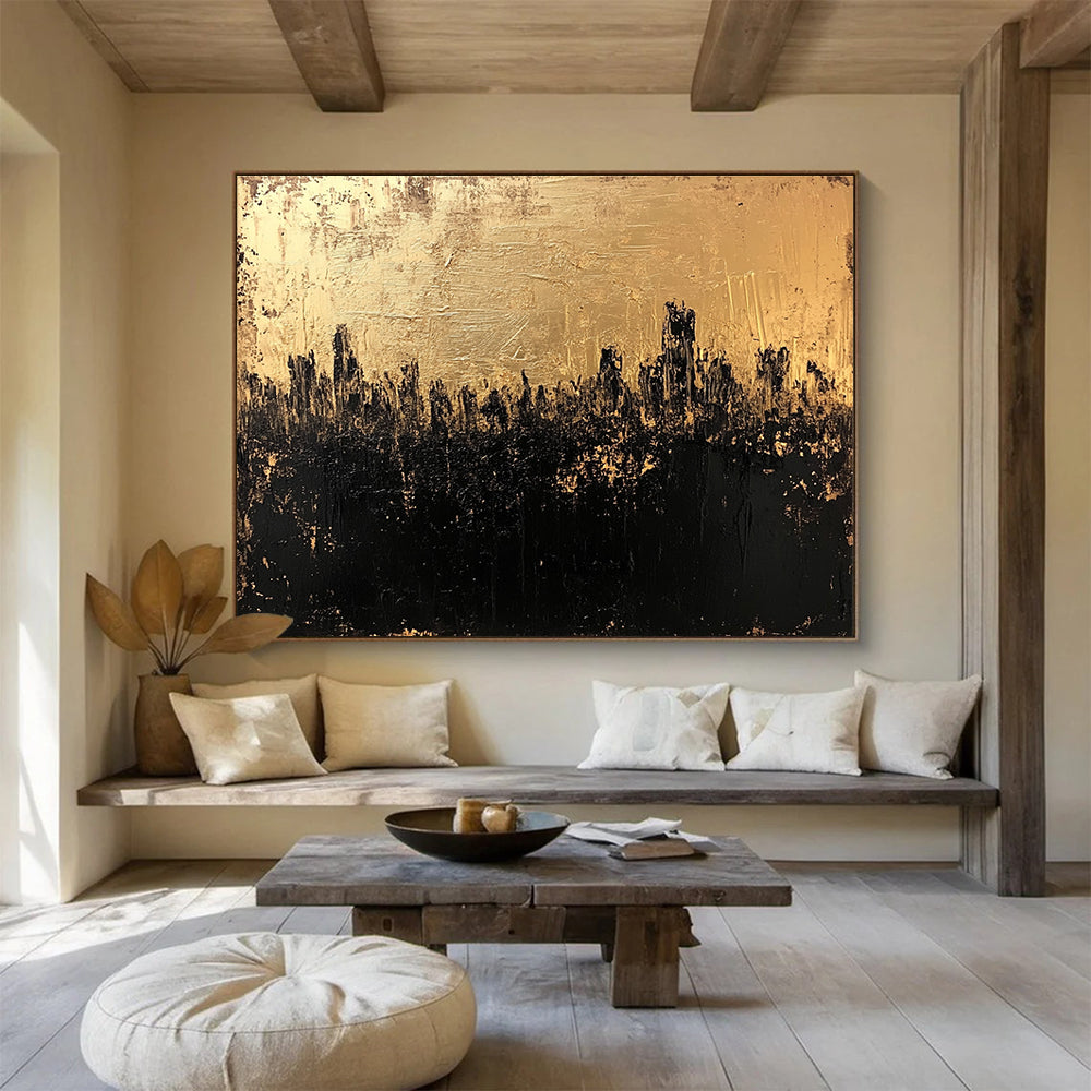 Large abstract painting in gold and black featuring a textured surface that captures a dark cityscape with an atmospheric moody quality.SC143