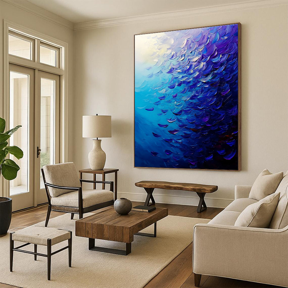 Large abstract painting of a vibrant ocean filled with fish in deep blue and purple hues featuring dynamic brush strokes and rich impasto texture.STSC866