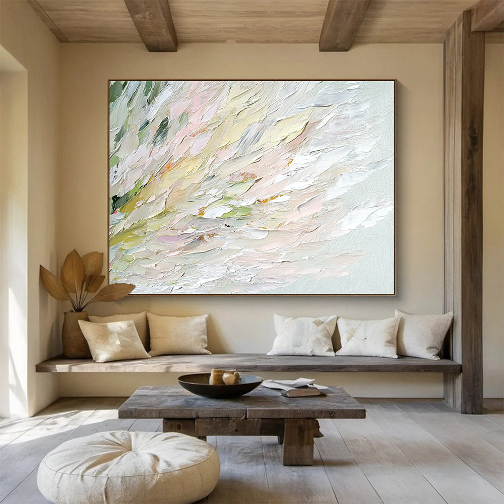 An abstract oil painting features soft swan feathers in whites greens pinks and yellows with a blurred water ripple background enhancing tranquility and elegance.SC450