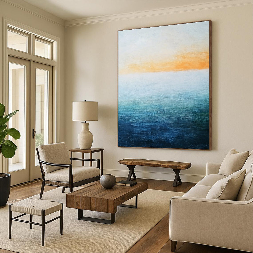 Abstract landscape featuring a vast water expanse in blue and green hues beneath a soft orange sky with a minimalist oil painting style.STSC074