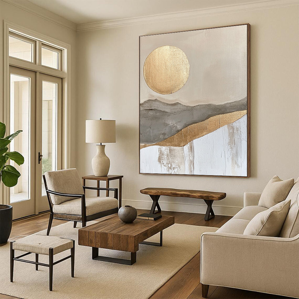 Large abstract painting featuring a golden sun and moon in a soft gray beige and white landscape with textured gold accents.STSC126
