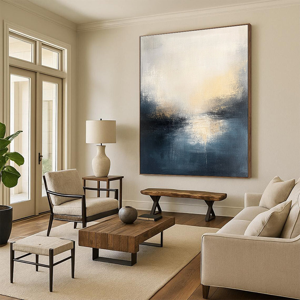 Large abstract oil painting featuring a misty gray and dark blue seascape with light yellow sun rays illuminating the horizon.STSC169
