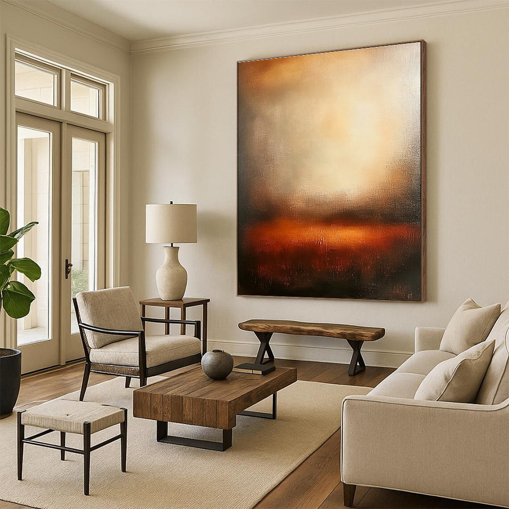 Large abstract painting featuring warm sunset colors with blurred edges and wide brush strokes evoking tranquility and emotional depth in a serene atmosphere.STSC111