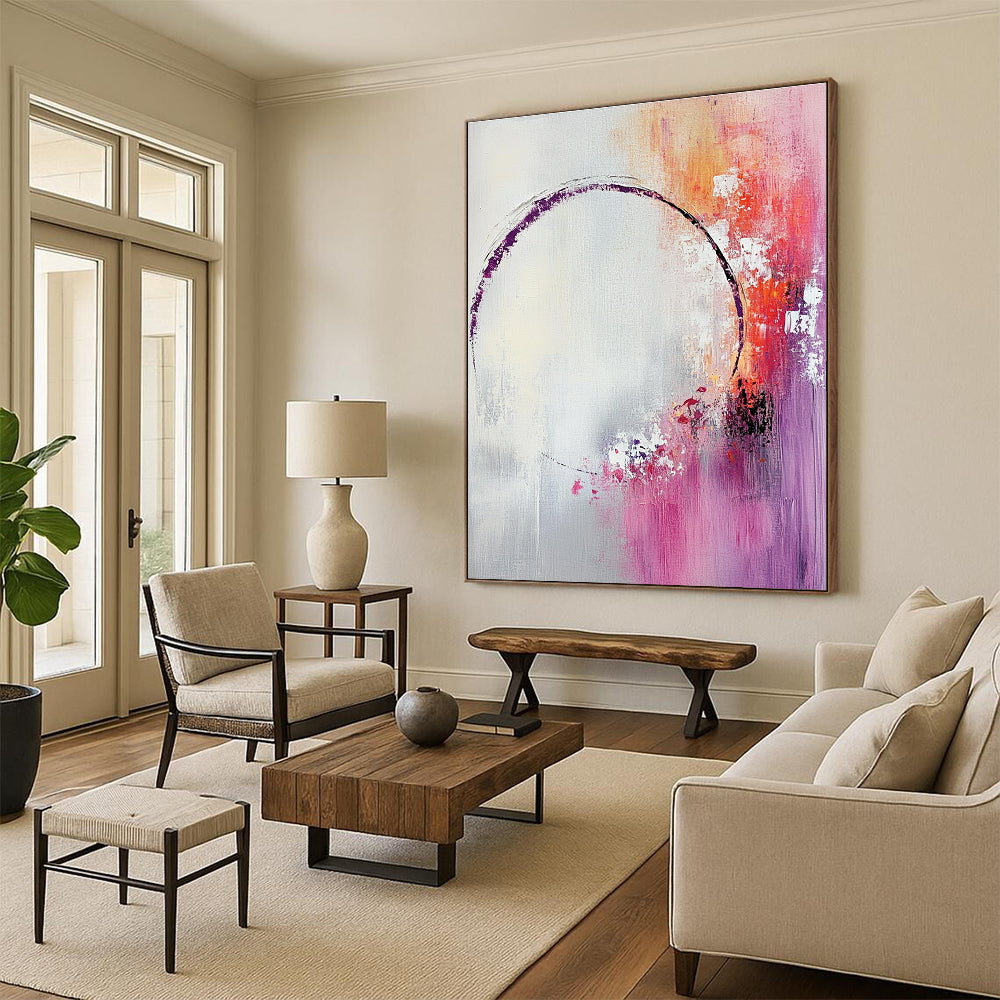 Large abstract painting featuring light pink and white shapes with a soft gray background and tranquil accents of purple and red.STSC429