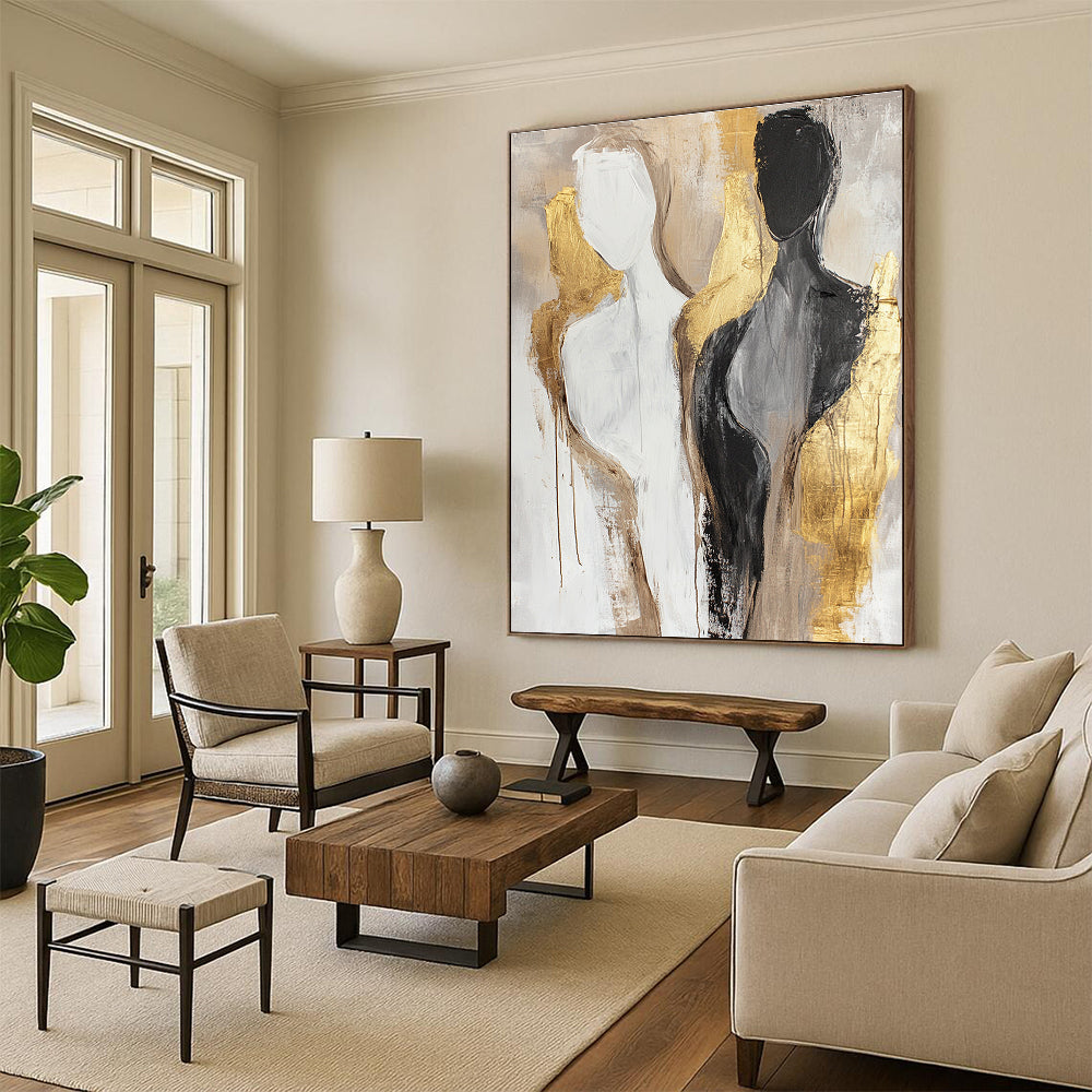 Large abstract painting featuring neutral tones and gold accents with female bodies in a minimalistic design and soft brush strokes.STSC441