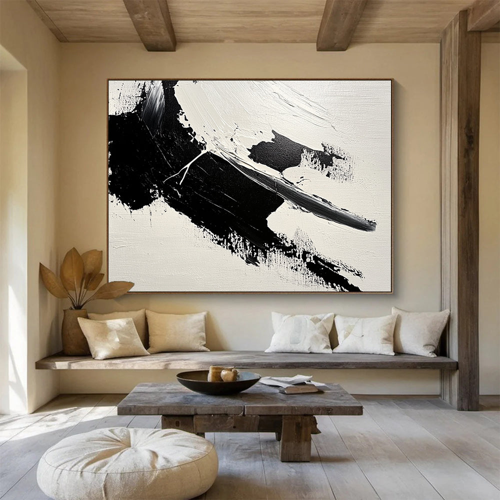 Large abstract painting featuring bold brushstrokes and textured areas of black and gray on a minimalist white background.SC574
