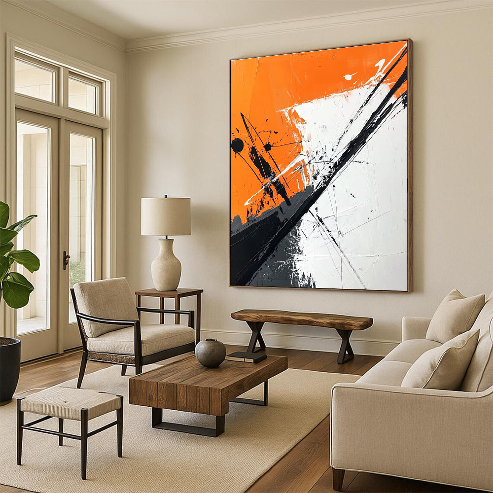 Large abstract painting features orange and white background with black brush strokes and dark gray diagonal line adding depth and artistic flair.STSC1118