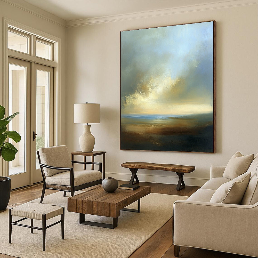 Large abstract painting depicting a dreamy sky with soft blues browns whites and beige clouds over a serene horizon at sea level.STSC886