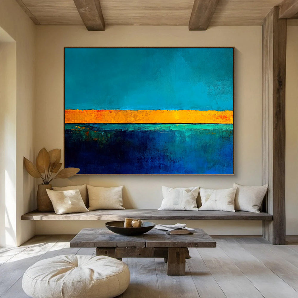 Large abstract painting featuring bold blue and yellow contrasts with a tranquil turquoise base and gold lines inspiring serenity and calmness.SC492